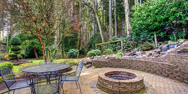 A Dedicated Firepit Zone Creates A Yearround Focal